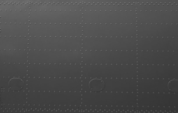 来自飞机金属外壳的抽象背景。图片下载