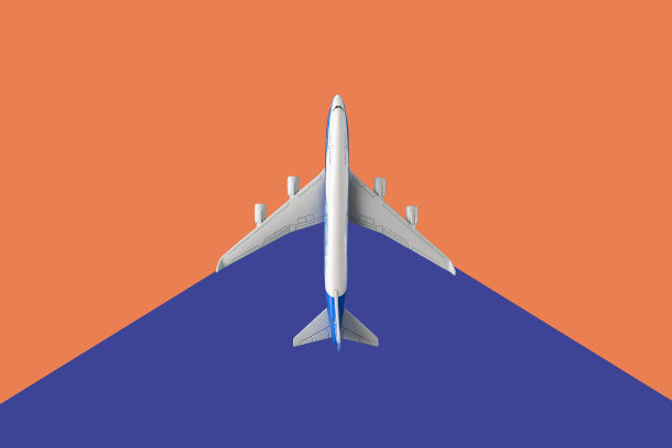 俯视图的飞机上一个双色背景创意旅游概念和复制空间图片下载