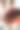 一个女人手里的橙色皮包的特写照片图片下载