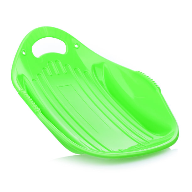 儿童的塑料雪橇孤立在白色的背景。冬天下山用的雪橇。孩子们的玩具。滑动板图片下载