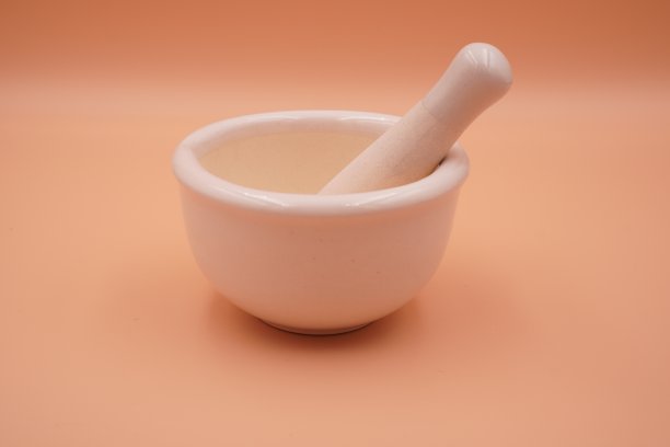 医疗:图为中等大小的臼和杵，特写，隔离。图片下载