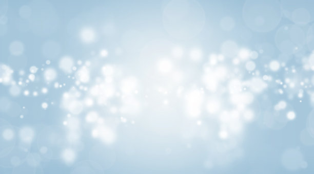抽象美丽的白色散景闪烁灯蓝色背景。离焦效果墙纸，庆祝圣诞背景。图片下载