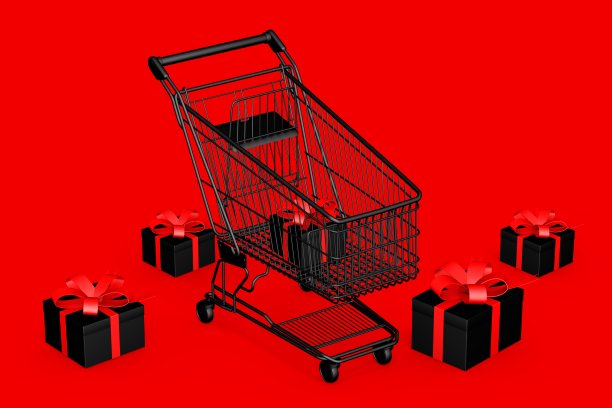 黑色礼品盒在红色背景的购物车，复制空间。黑色星期五的概念图片下载