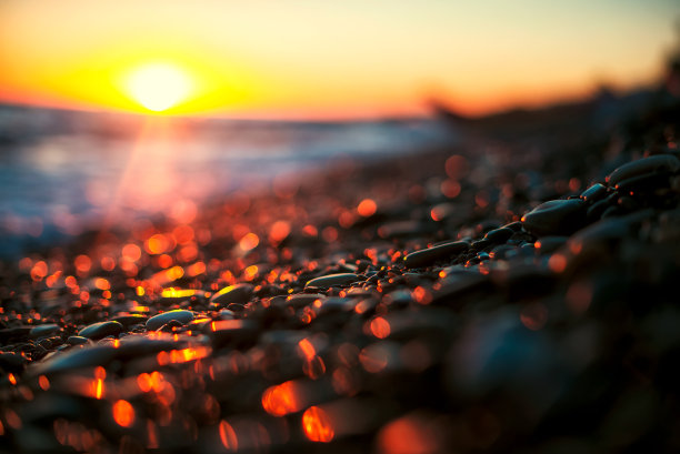 美丽的自然背景从日落波凯在石头海岸图片下载