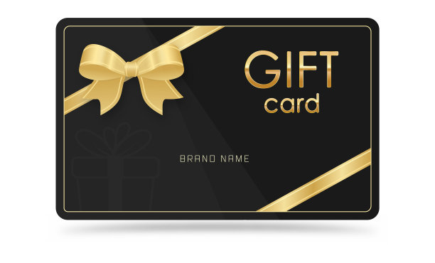 礼品卡上装饰有金色缎带和蝴蝶结图片下载