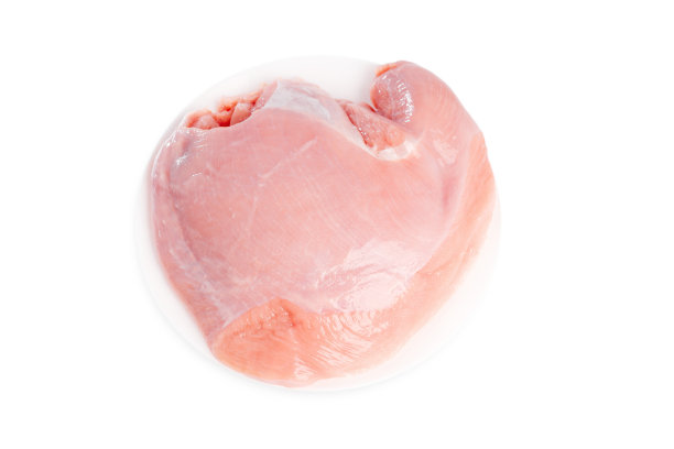 白色背景俯视图上孤立的生火鸡片。新鲜的生火鸡胸肉。白底火鸡片。Isolade。图片下载