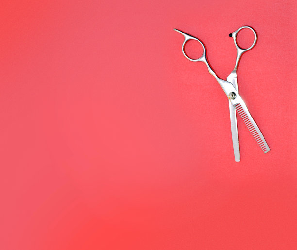 理发剪刀在彩色背景图片下载