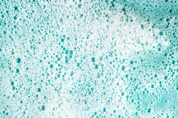 肥皂泡沫上蓝色的泡沫质地背景背景图片下载