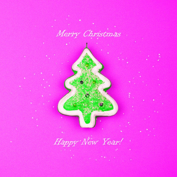 带有圣诞树的圣诞卡，以明亮的粉红色为背景。圣诞节的背景。图片下载