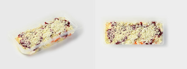 白色背景的沙拉油醋汁，装在供外卖服务用的塑料容器里。图片下载