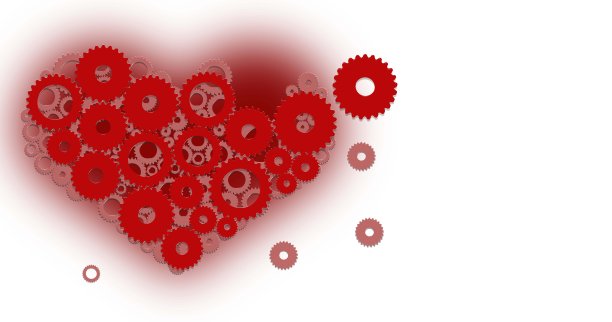 由向不同方向飞行的齿轮组成的心脏。图片下载