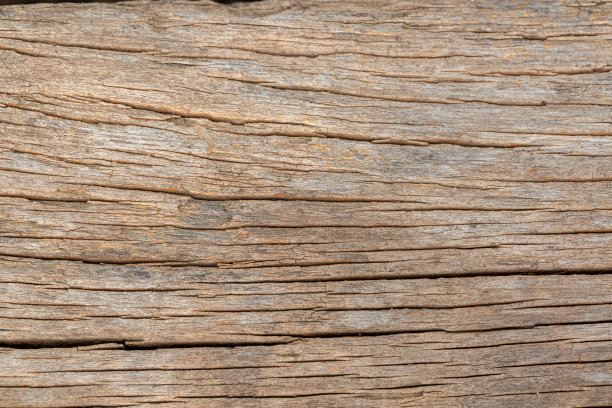 大木色背景，带有天然裂缝的老木地板，棕色木质质感图片下载