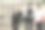 三个多种族的商人带着摩托车头盔离开工作图片下载