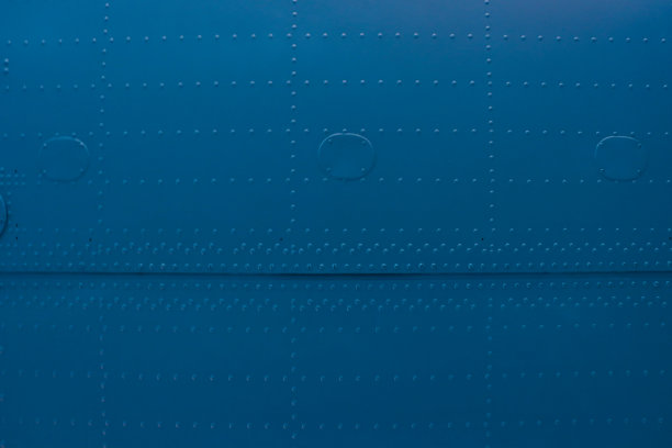 飞机铝制外壳的抽象背景。图片下载