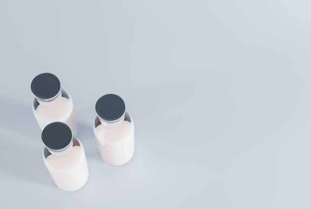 复古的瓶子和牛奶在一个明亮的背景。图片下载