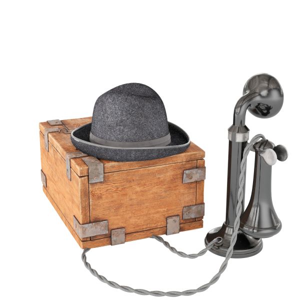 3D渲染的老式手机设备附近的一个木箱与帽子孤立在白色背景图片下载