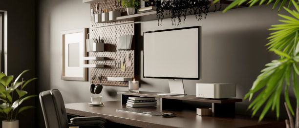 现代城市黑暗的家庭工作空间与PC电脑模型和桌上的装饰图片下载