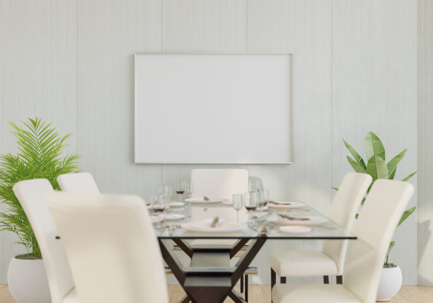 房间里的一套桌椅，墙上挂着一个相框。图片下载