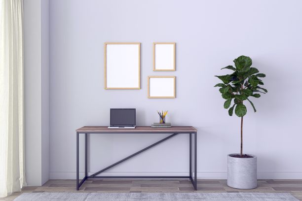 一个工作台与笔记本电脑和不同的物体在灰色墙壁的房间- 3D渲染图片下载