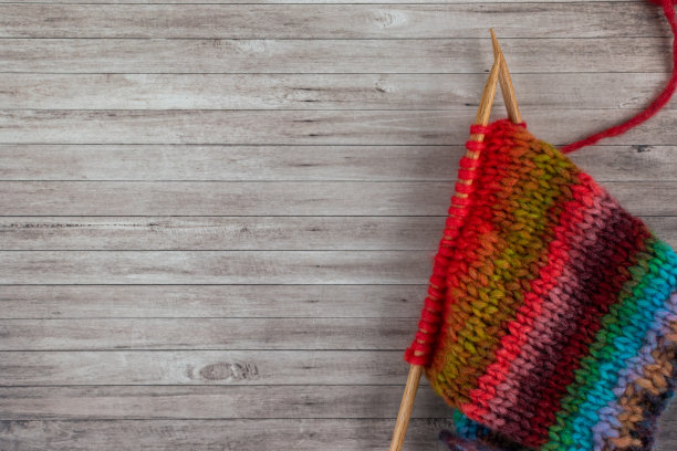 手工编织，自条纹纱为背景图片下载