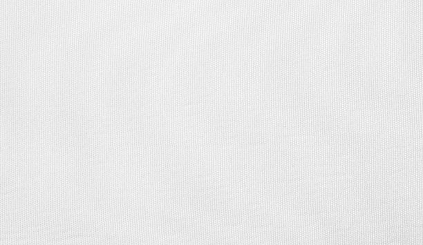 白色棉质背景。由天然纺织材料制成的织物。图案质地白布概念图片下载