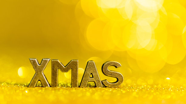 离焦的圣诞金色灯光背景图片下载