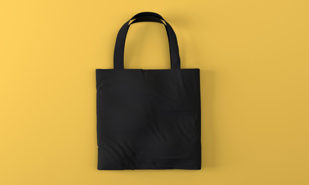 生态帆布手提袋孤立在黄色背景图片下载