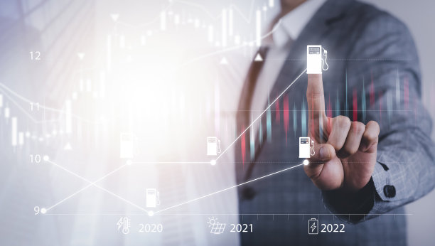 世界市场石油能源图，对经济概念的影响，商人触摸图与加油站油价下跌指标，油价波动和外汇交易。图片下载