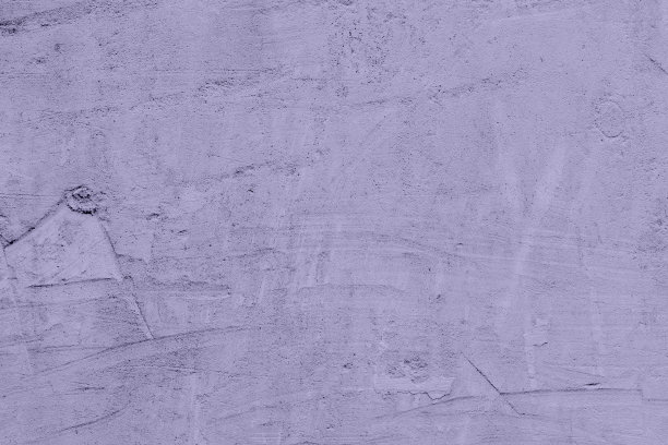 2023年度数字薰衣草色。浅紫色背景上破旧的混凝土墙。照片采用了2023年的潮流色彩。图片下载