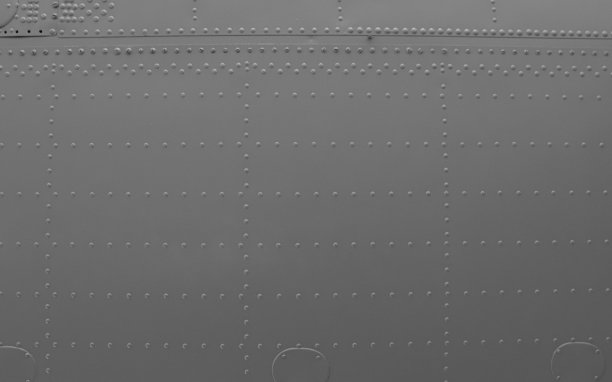 带铆钉的飞机金属板纹理图片下载
