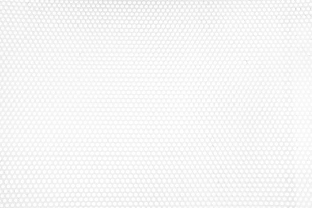 白洞穿孔墙纹理背景。图片下载