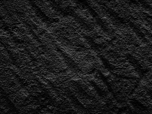 黑色切割石材纹理背景。深色切割，表面有凿痕。图片下载