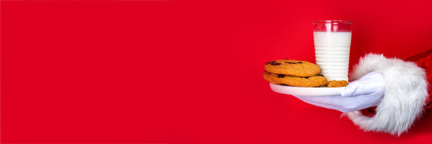 圣诞老人摘饼干的手图片下载