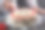 特写镜头，一个男人的手装饰传统的黑森林蛋糕与樱桃在桌子上图片下载