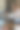 垂直拍摄进取的年轻女糕点师在行星搅拌机中添加巧克力图片下载