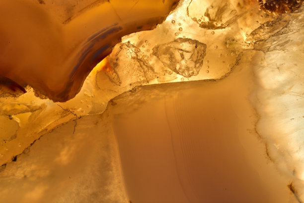 奢华的原黄色玛瑙水晶表面质地作为背景。自然图案表面，抽象设计元素的矿物石材宏观特写。图片下载