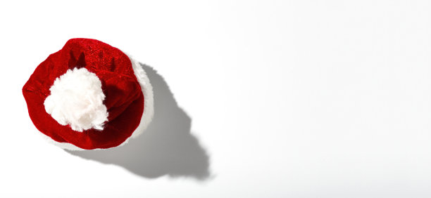 圣诞老人的红帽子与上面的彩色背景隔离开来图片下载