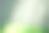 模糊的白光光束与来自底部背景的绿光。图片下载