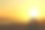 夕阳下的海滩，阳光下人们的剪影图片下载