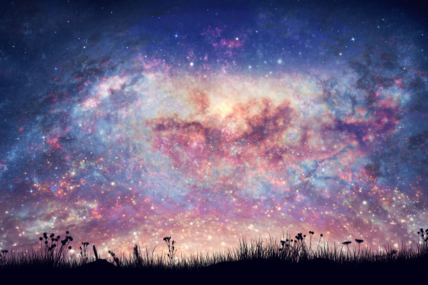 草地在夜空与太空星云和发光的星星图片下载