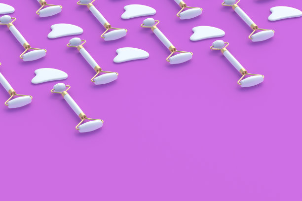 面部按摩滚筒和刮砂器。提颜健体。化妆品配件。面部皮肤护理。副本的空间。三维渲染图片下载