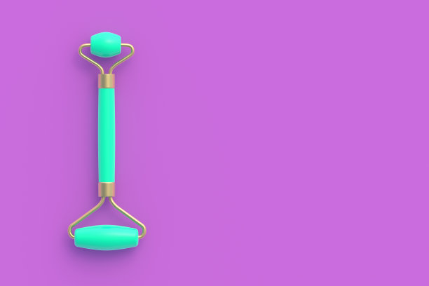 面部按摩滚筒。提颜健体。化妆品配件。面部护肤品。副本的空间。前视图。三维渲染图片下载