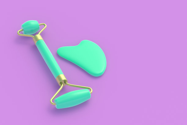 面部按摩用滚轮和刮砂石。提颜健体。化妆品配件。面部皮肤护理。副本的空间。三维渲染图片下载