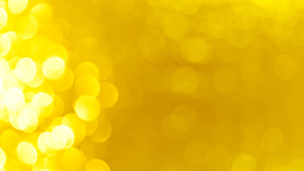 离焦的圣诞金色灯光背景图片下载