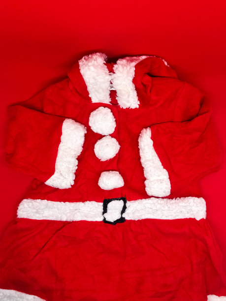 儿童用的圣诞老人布，红色背景绝缘图片下载