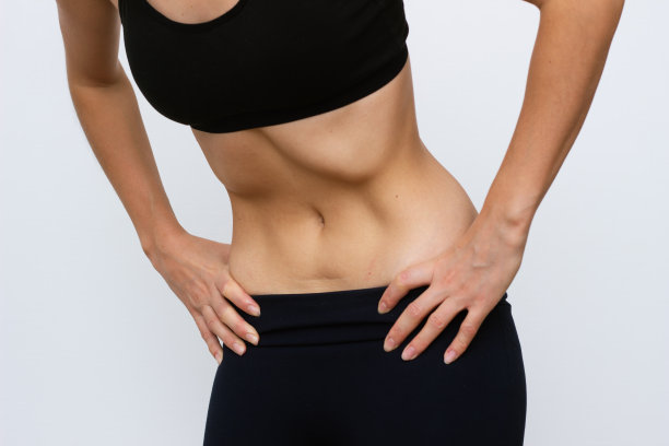 健身妇女做胃真空运动图片下载