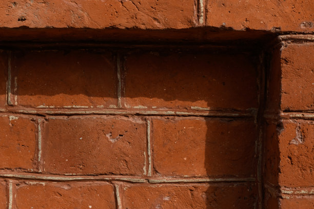 老砖墙与阴影质感的特写图片下载