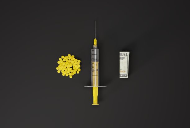 一个注射器，一些药片和一张卷起来的钞票。图片下载