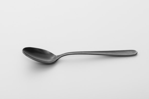 银匙孤立在白色背景上。影棚拍摄。图片下载