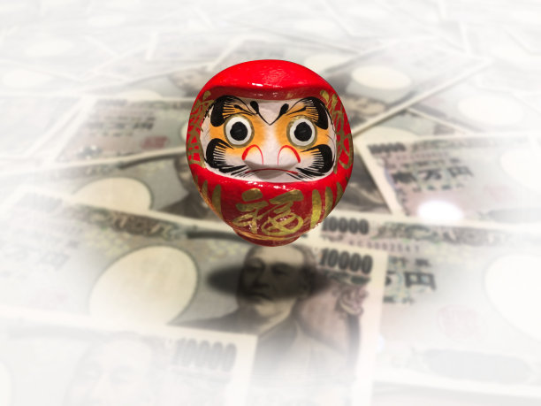 达摩娃娃和日本钞票图片下载